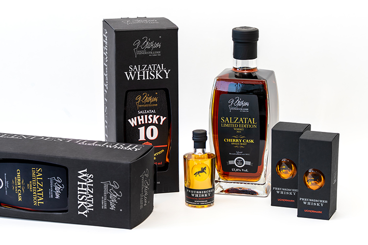 Dos marcas de Whisky, una escritura común: Exclusivas soluciones de embalaje de papeles reciclados premium negros